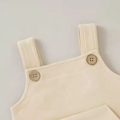 The top of the baby and toddler overalls with the buttons