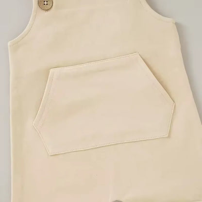 the pocket of the baby and toddler overalls in beige colour
