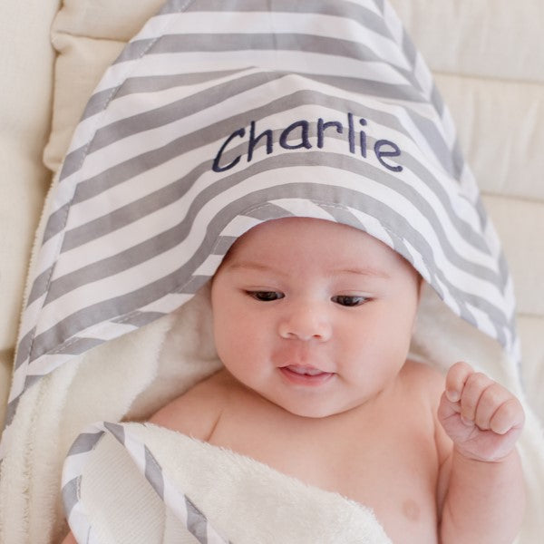 baby wearing grey stripe hooded bath towel newborn gift personalise with baby name embroidery