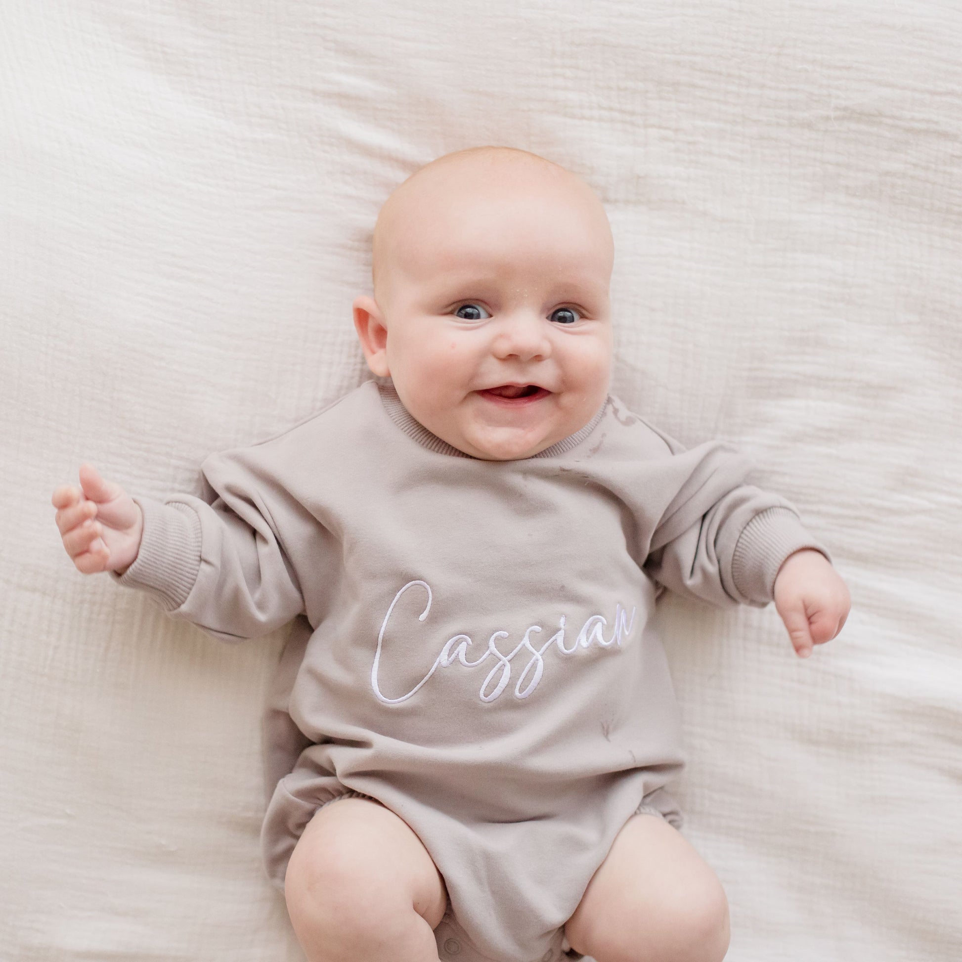 Grey Romper personalised with embroidery. Childs name embroidered