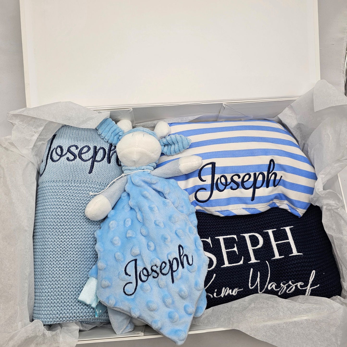 Gift box with blanket, towels, comforter personalised with embroidery