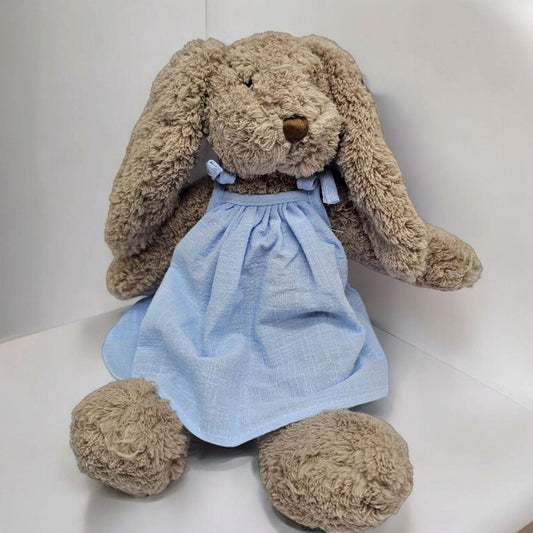 Mrs Honey Bunny wearing a light blue dress