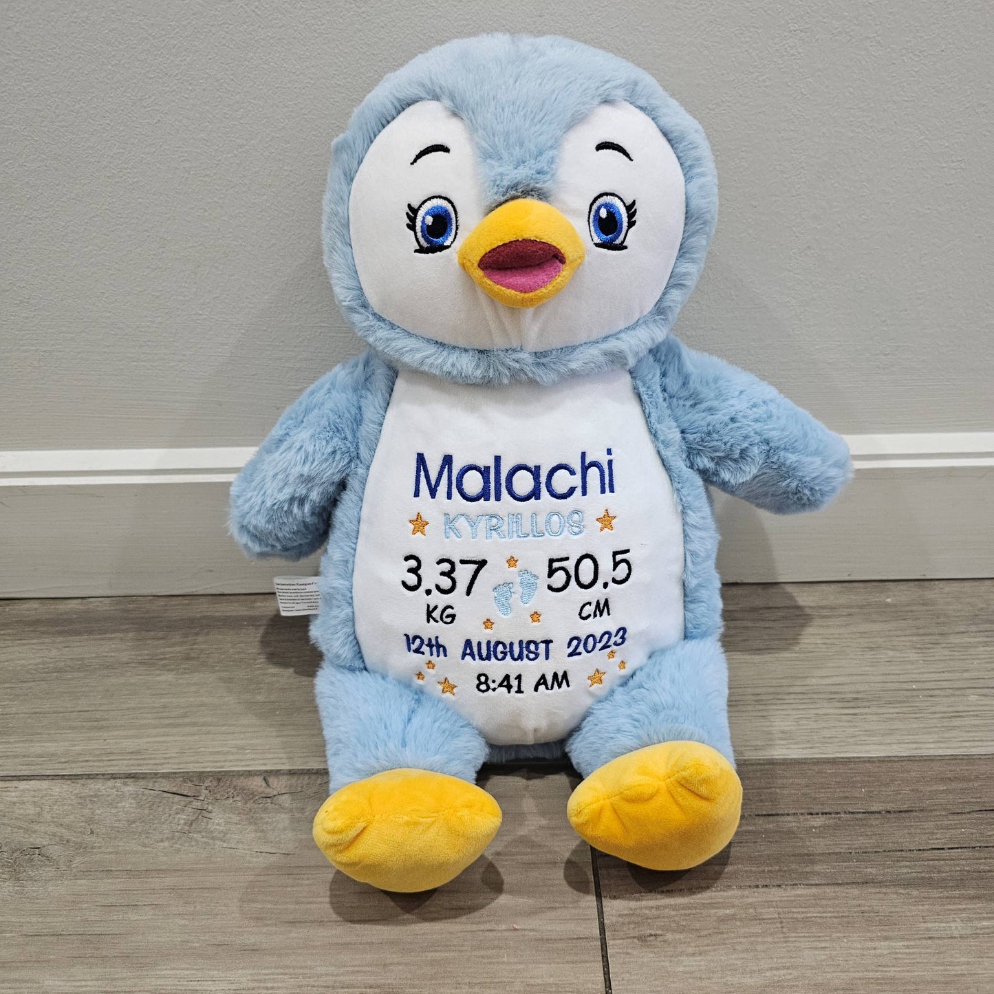 blue penguin cubby teddy personalised with a birth block embroidery